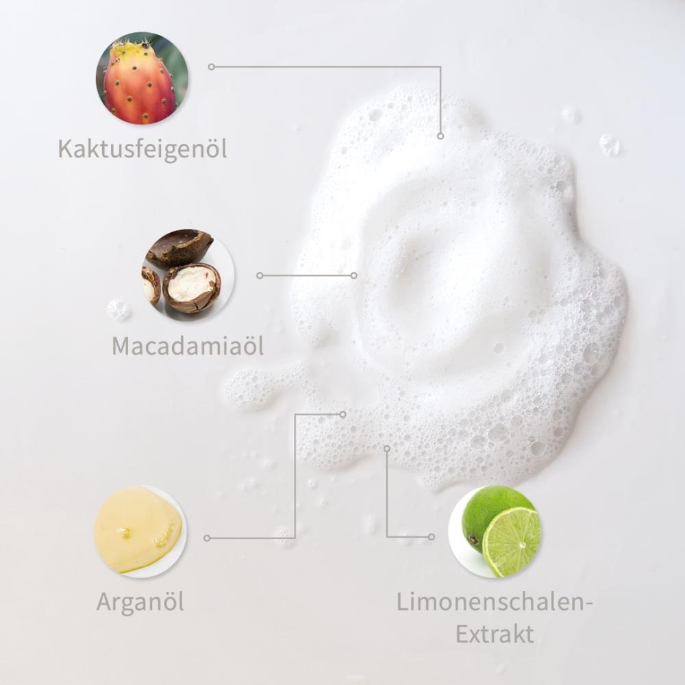 Weiße Pflege-Schaum mit markierten Inhaltsstoffen: Limonenschalen-Extrakt, Kaktusfeigenöl, Macadamiaöl und Arganöl.