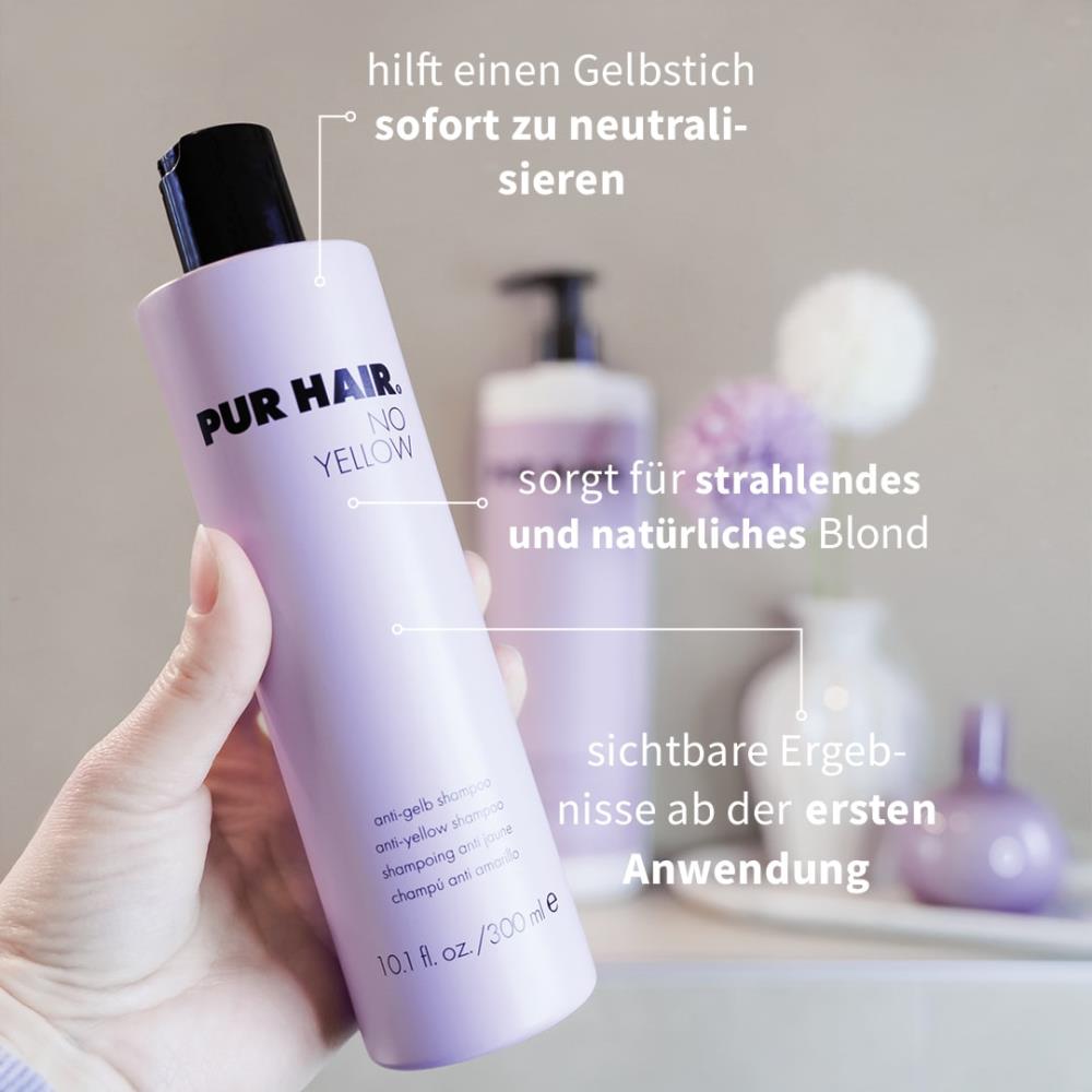 PUR HAIR No Yellow Shampoo in lila Flasche wird in der Hand gehalten – Anti-Gelbstich-Shampoo, das sofort neutralisiert und für ein strahlendes, natürliches Blond sorgt, mit sichtbaren Ergebnissen ab der ersten Anwendung