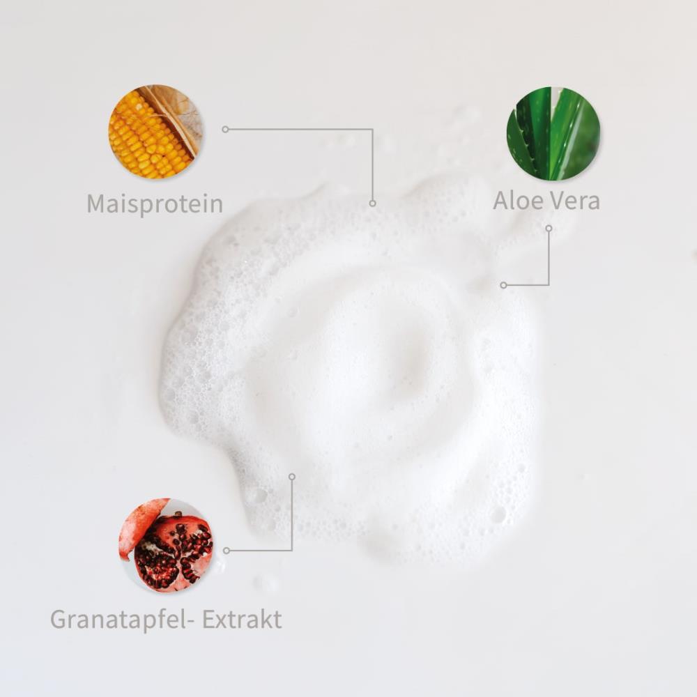 Weiße Pflege-Schaum mit markierten Inhaltsstoffen: Maisprotein, Aloe Vera, Granatapfel Extrakt