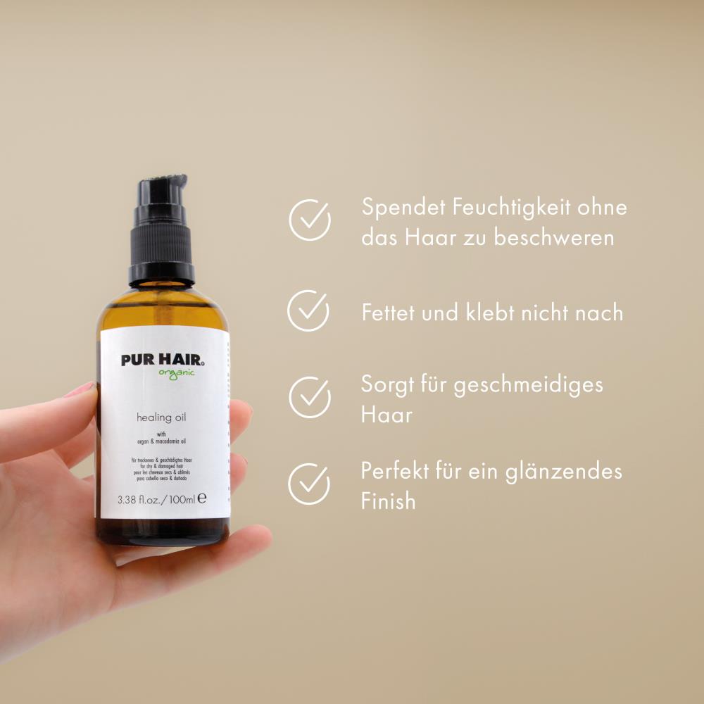 Braune Glasflasche PUR HAIR Organic Healing Oil in Hand gehalten. Haaröl spendet Feuchtigkeit ohne zu beschweren, klebt nicht, sorgt für Geschmeidigkeit und Glanz